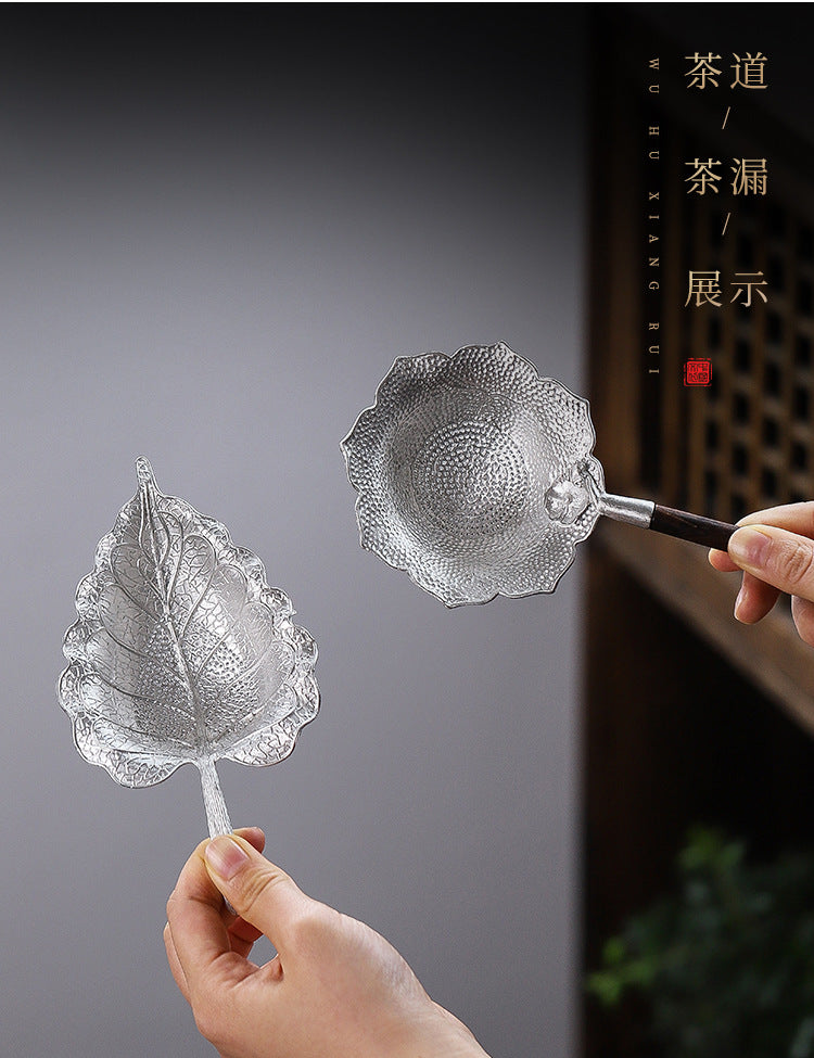 This is a tin tea scoop tea filter