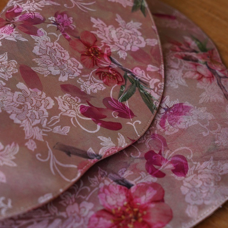 This is a silk brocade tea mat.this is a waterproof table cloth