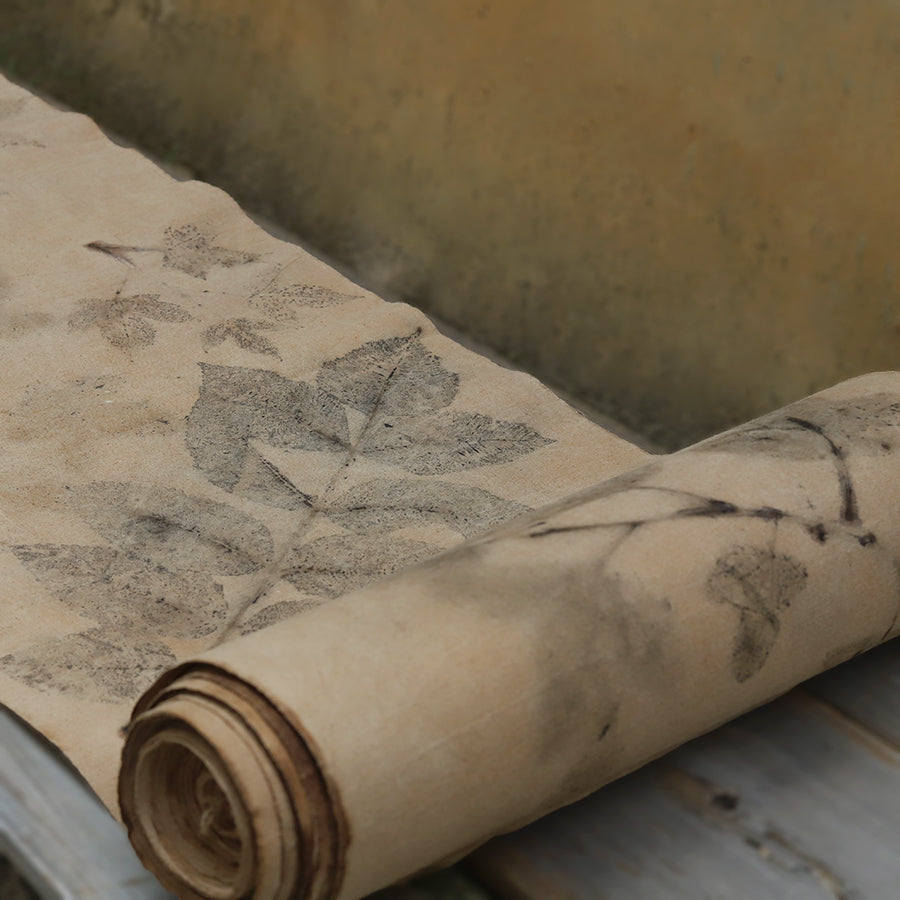 This is a plant-dyed tea mat table cloth