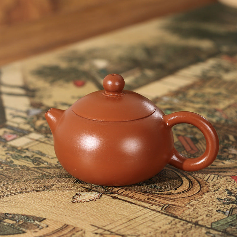 This is a Chaozhou teapot.this is Chaozhou red clay zhuni teapot