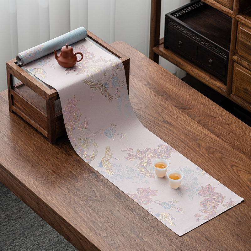 This is a silk brocade tea mat.this is a waterproof table cloth