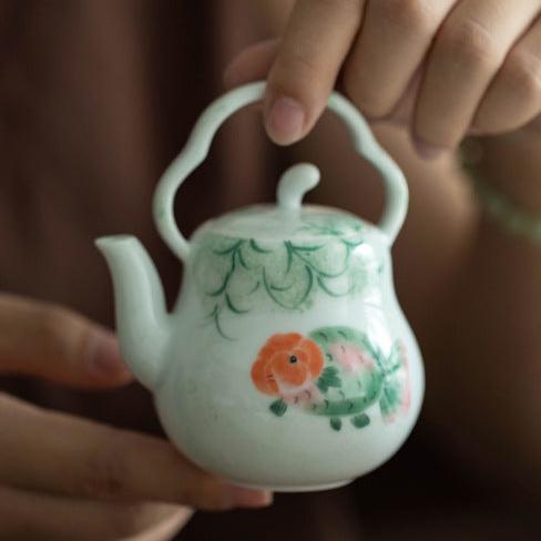 this is a ceramic teapot