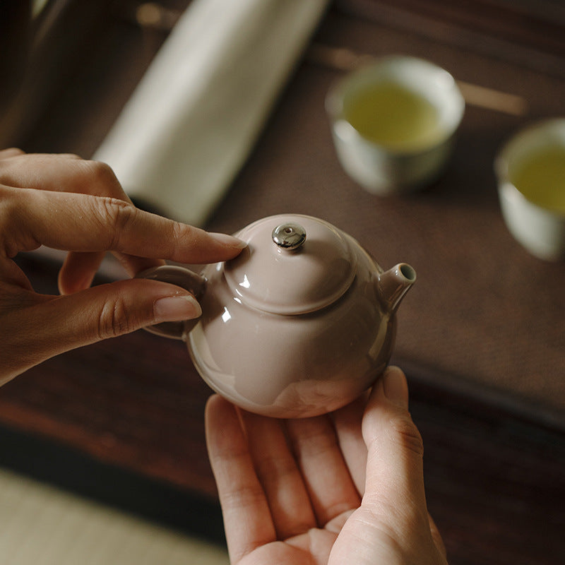 This is a ceramic teapot