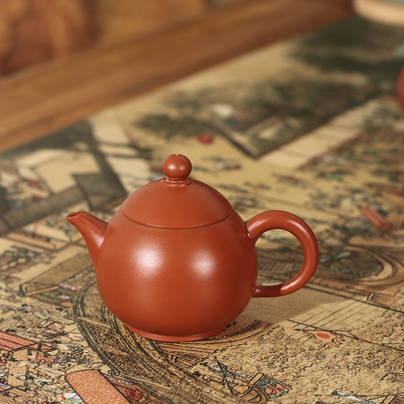 This is a Chaozhou teapot.this is Chaozhou red clay zhuni teapot