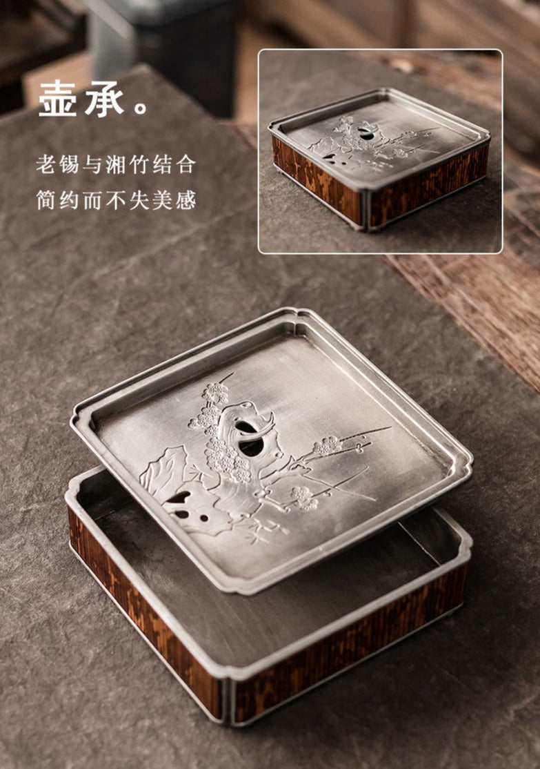 this is a tin tea tray tea boat