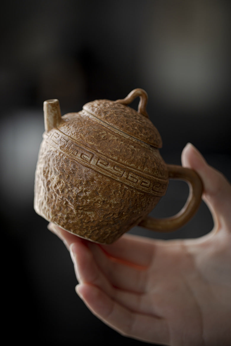 this is a pottery teapot