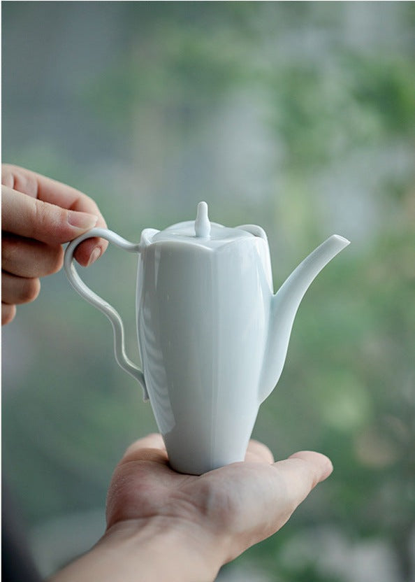 This is a ceramic teapot