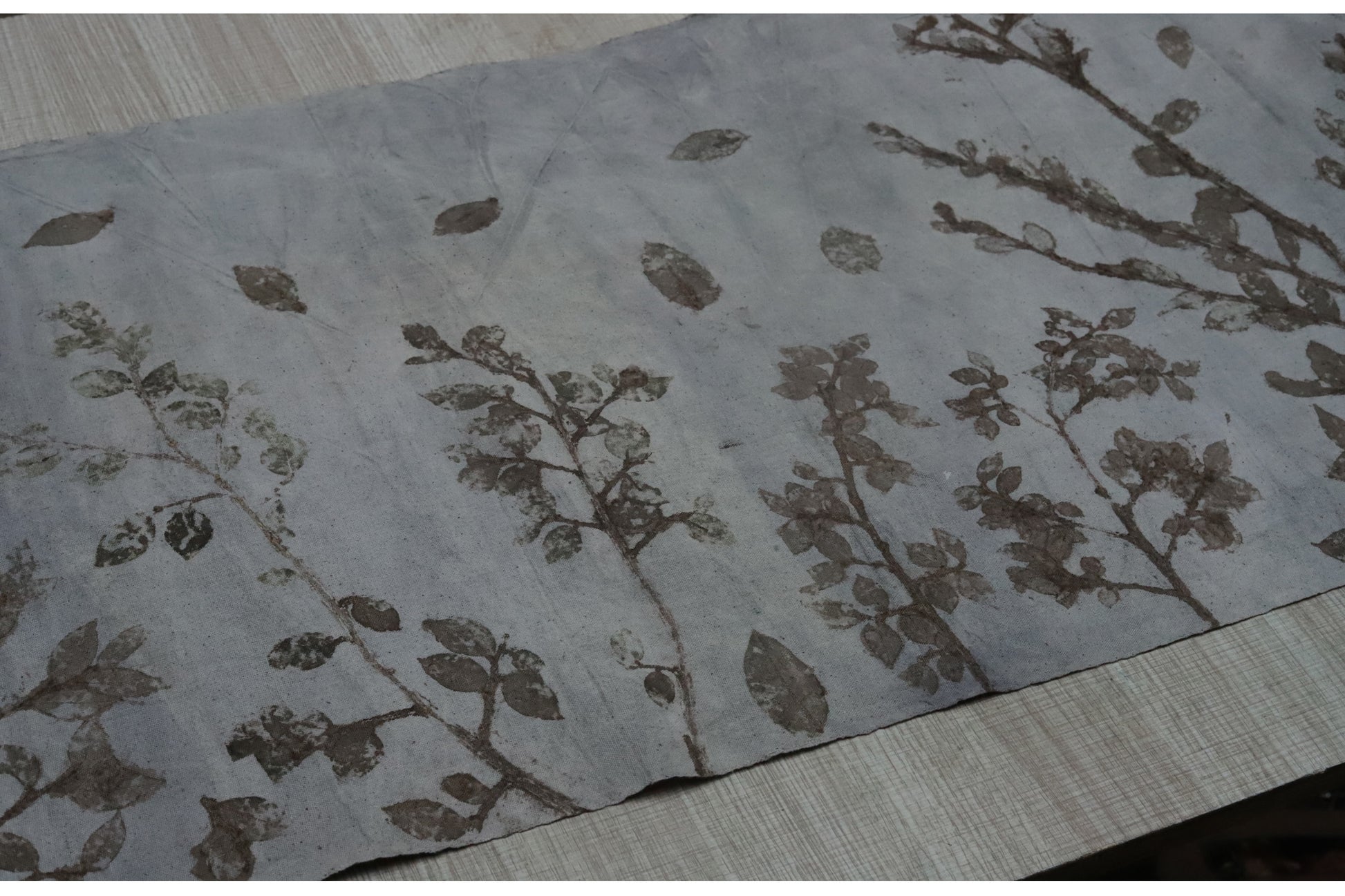 This is a plant-dyed tea mat table cloth