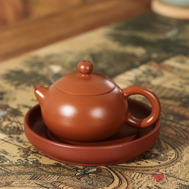 This is a Chaozhou teapot.this is Chaozhou red clay zhuni teapot