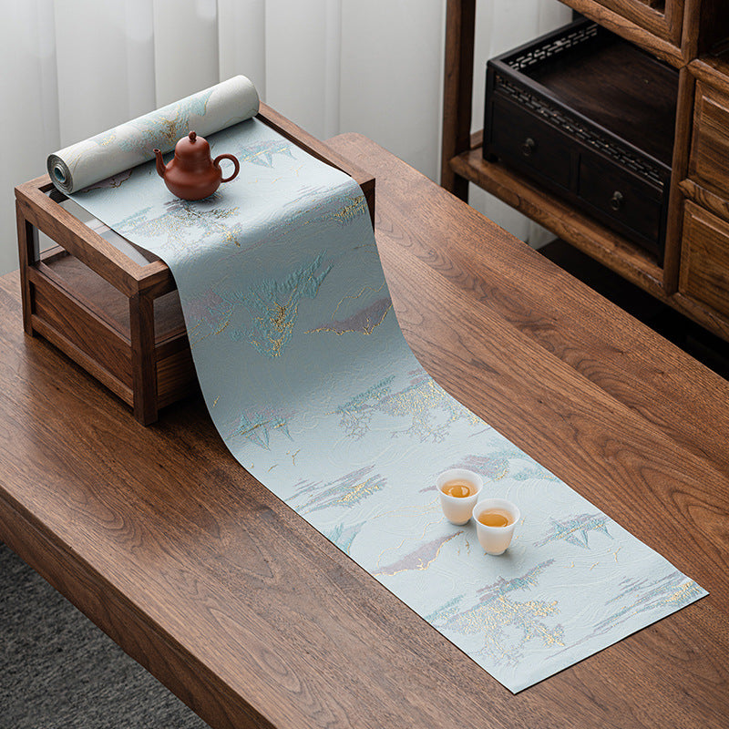 This is a silk brocade tea mat.this is a waterproof table cloth