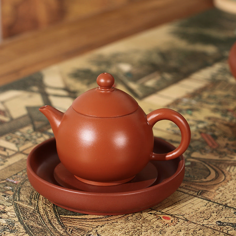 This is a Chaozhou teapot.this is Chaozhou red clay zhuni teapot