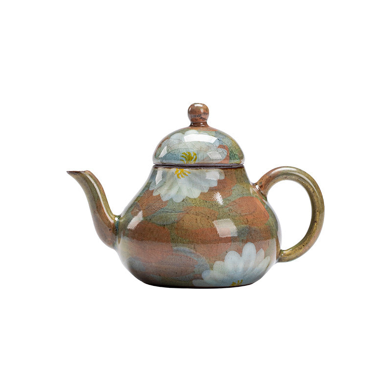 This is a ceramic teapot.this is an iced crackled teapot