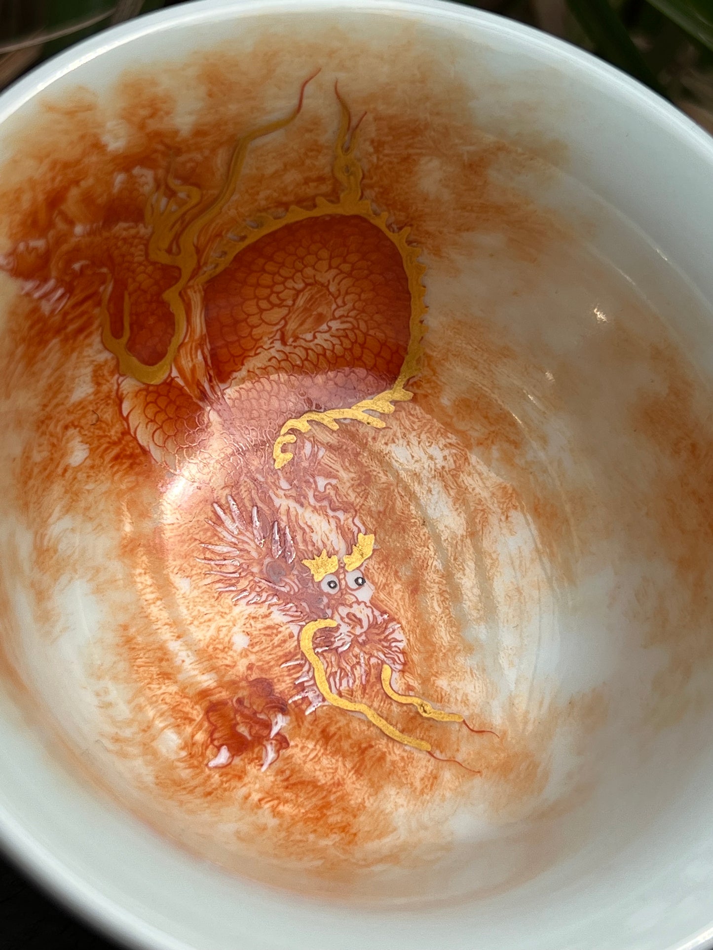 this is a Chinese Jingdezhen alum red dragon phoenix teacup. this is a ceramic teacup