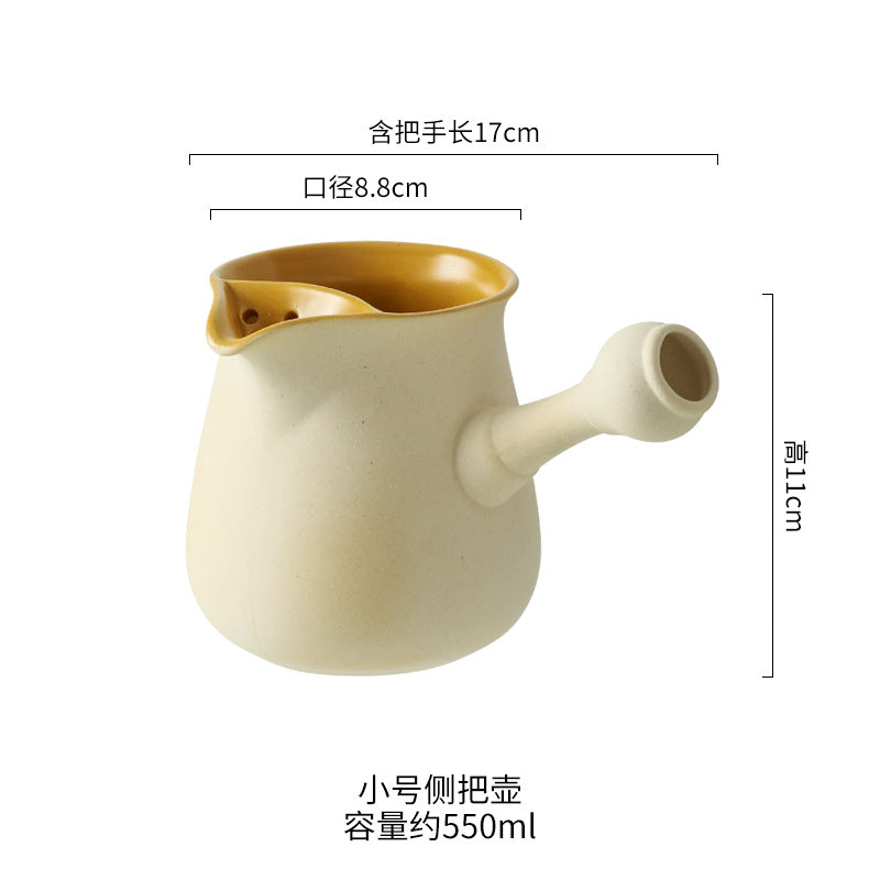 This is a pottery side handle kettle