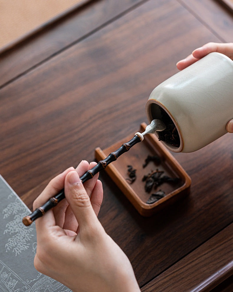 This is a tin tea scoop tea spoon