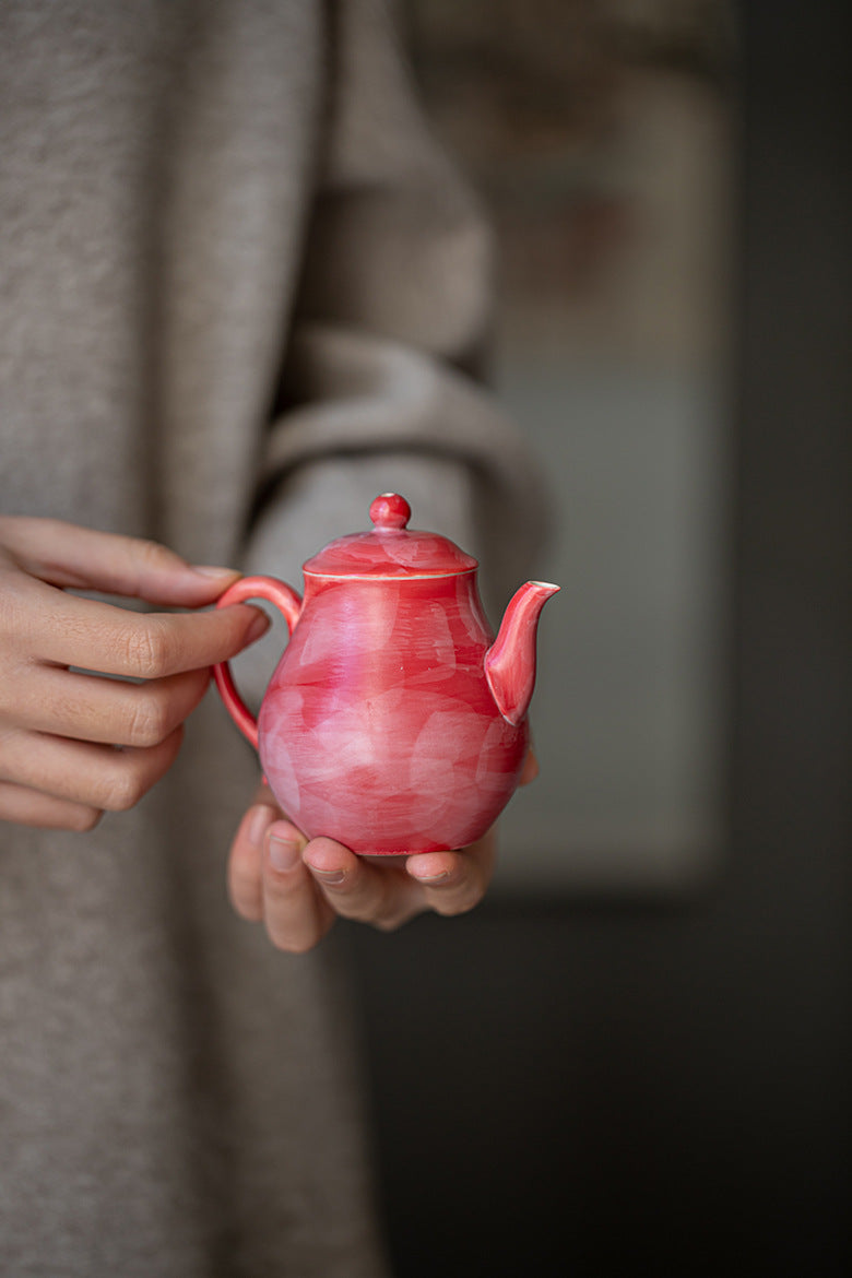 This is a ceramic teapot