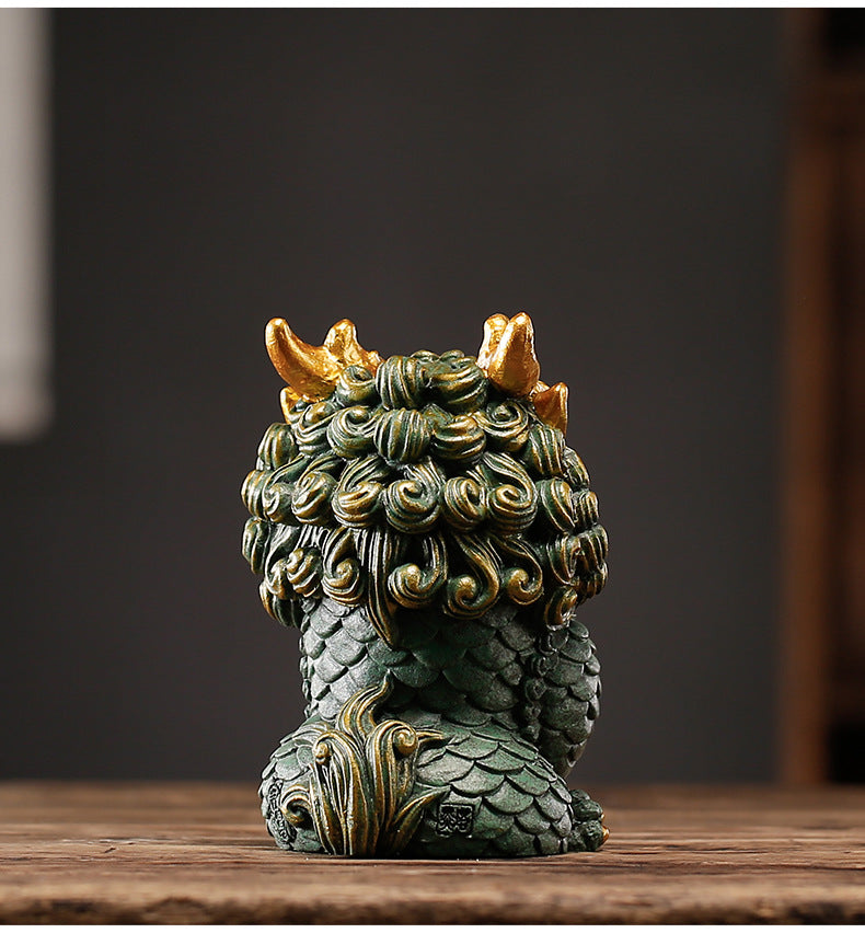 This is a pottery dragon teapet