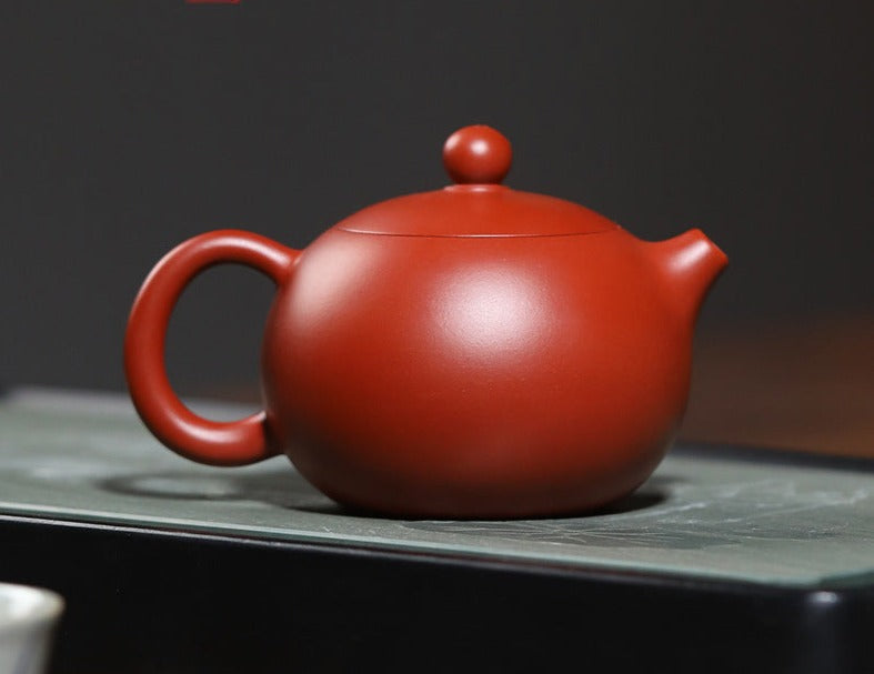 This is a pottery teapot.this is a Zhuni red clay teapot.