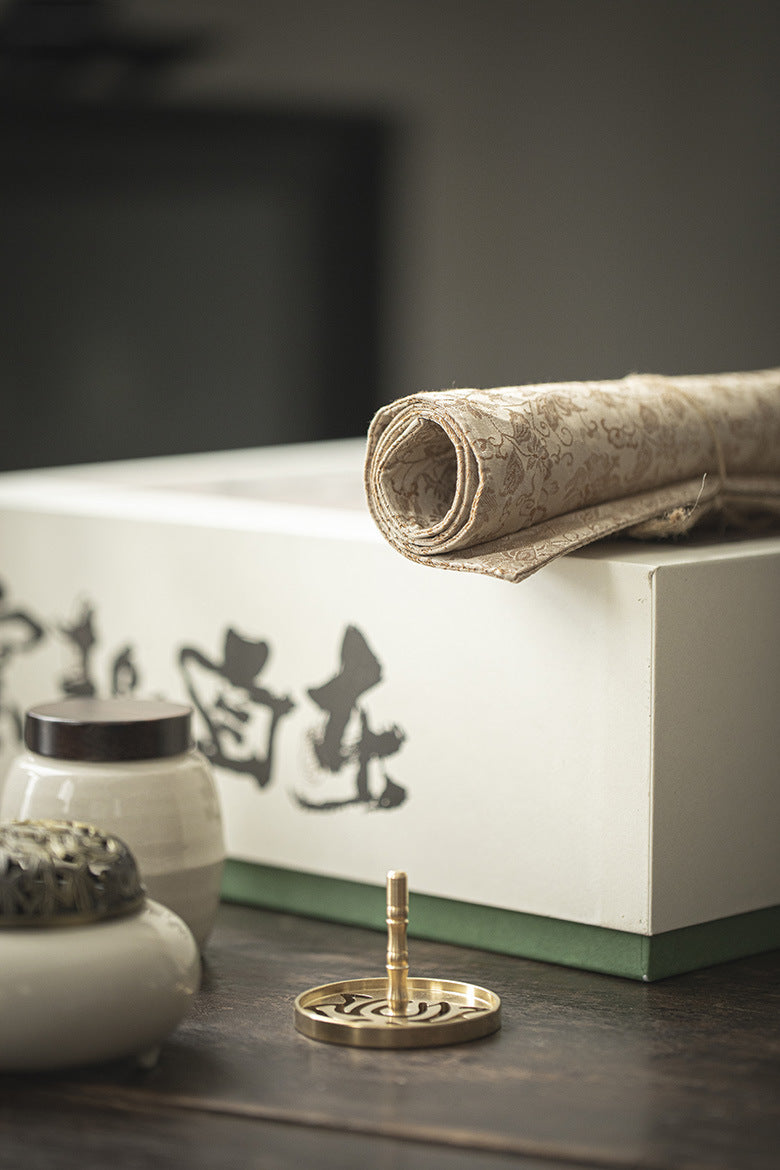 This is a silk brocade tea mat.this is a waterproof table cloth