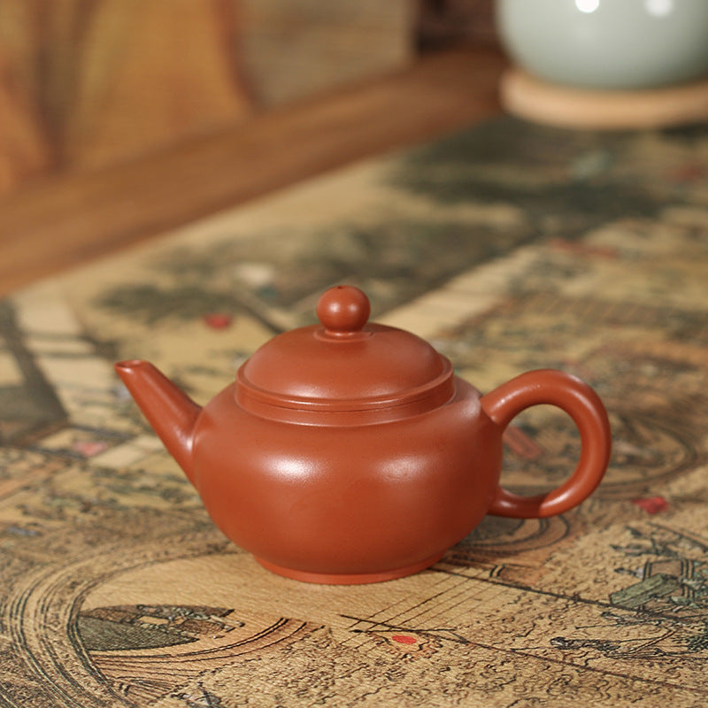 This is a Chaozhou teapot.this is Chaozhou red clay zhuni teapot