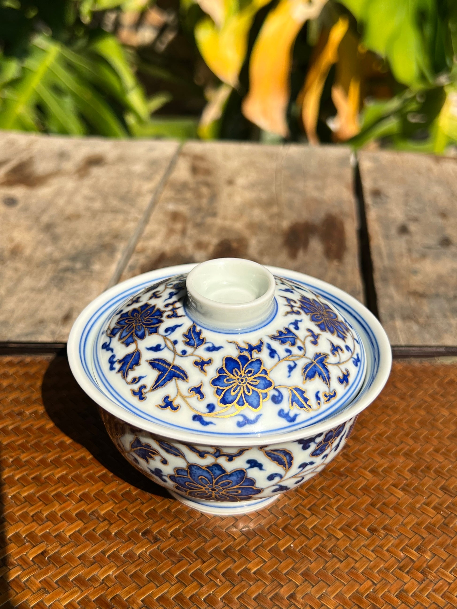 This is a Chinese Jingdezhen blue and white porcelain flower teapot gaiwan