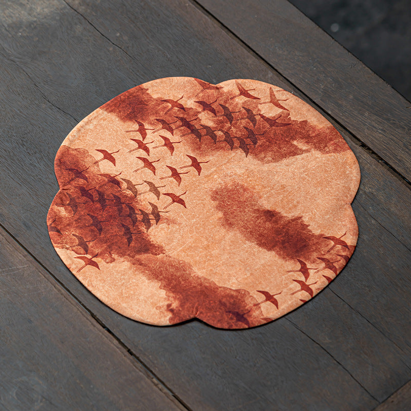 This is a silk brocade tea mat.this is a waterproof table cloth