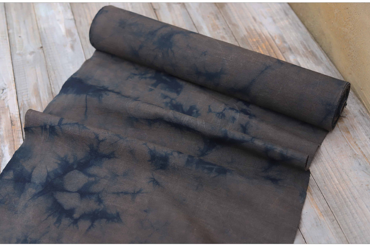 This is a plant-dyed tea mat table cloth