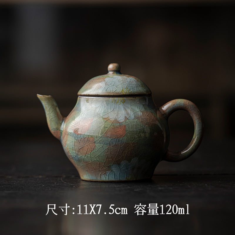 This is a ceramic teapot.this is an iced crackled teapot