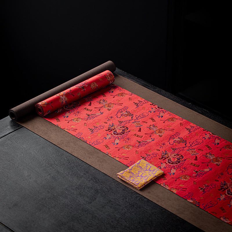 This is a silk brocade tea mat.this is a waterproof table cloth