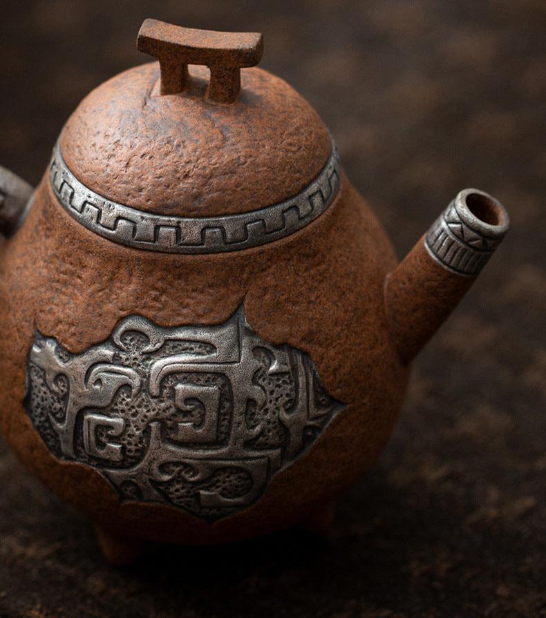 this is a pottery teapot. this is a pear teapot