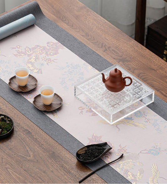 This is a silk brocade tea mat.this is a waterproof table cloth