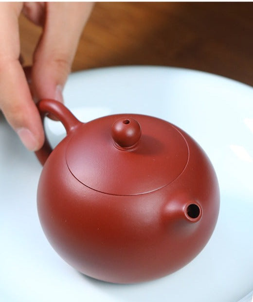 This is a pottery teapot.this is a Zhuni red clay teapot.