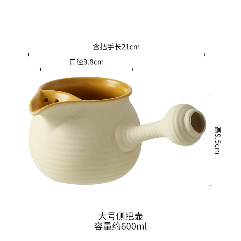 This is a pottery side handle kettle