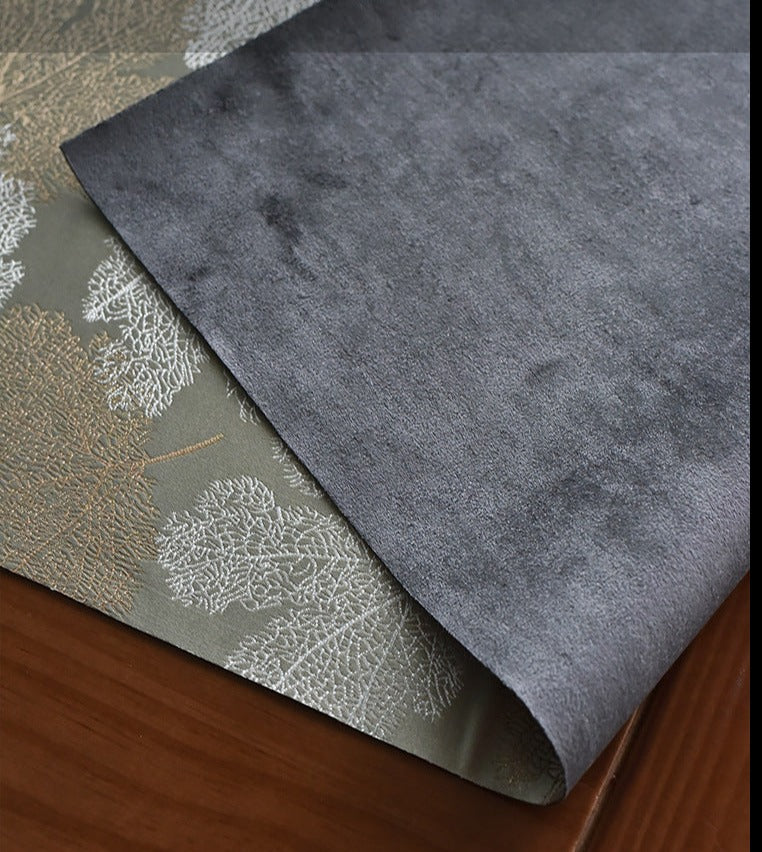 This is a silk brocade tea mat.this is a waterproof table cloth