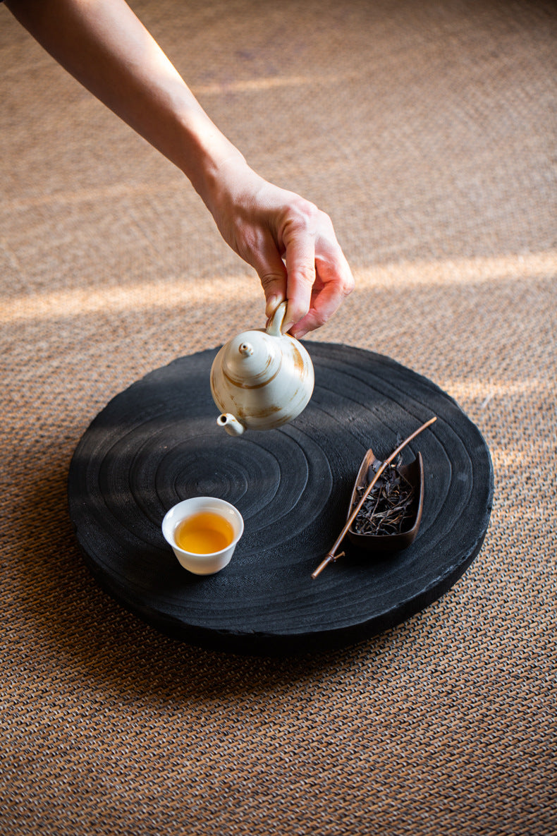 This is a black cedar tea tray tea boat.This is a wooden tea table.