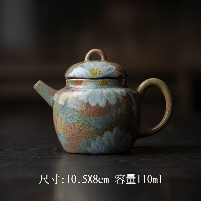 This is a ceramic teapot.this is an iced crackled teapot