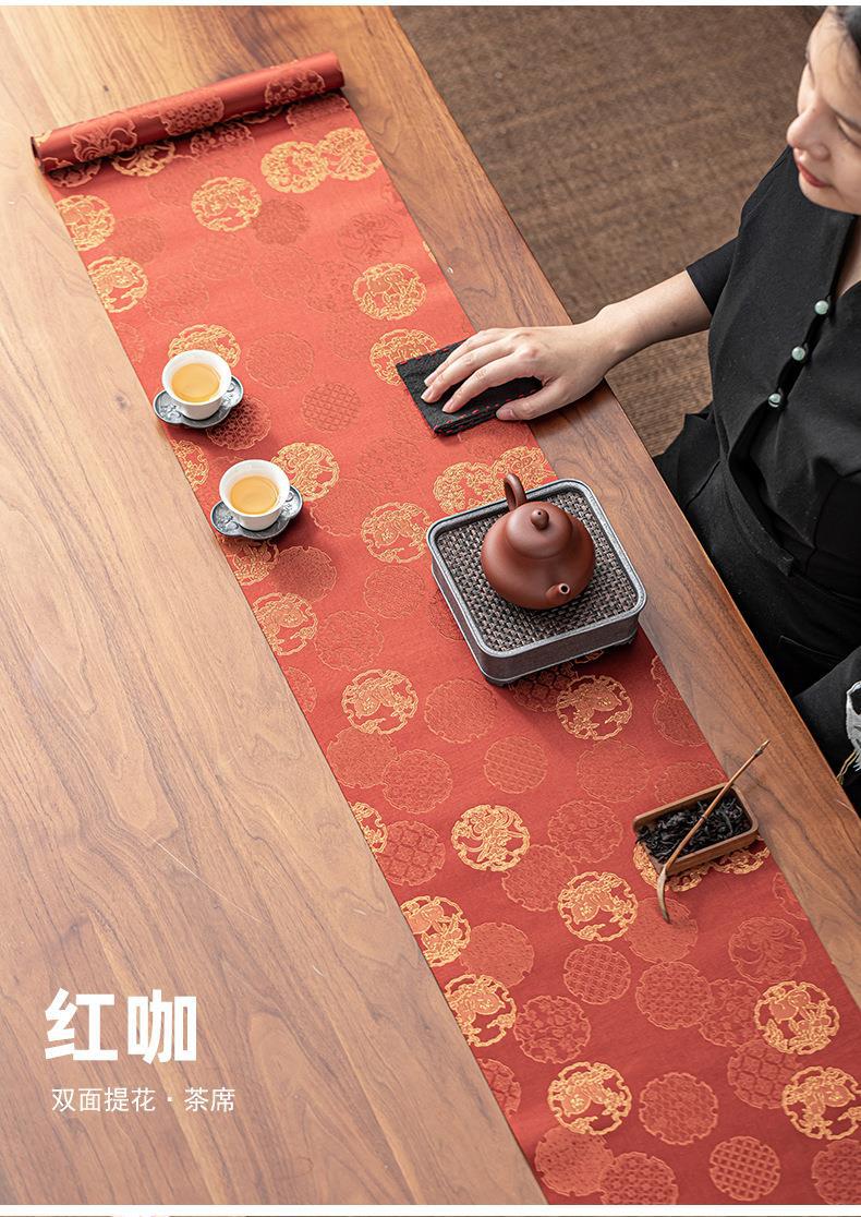 This is a silk brocade tea mat.this is a waterproof table cloth