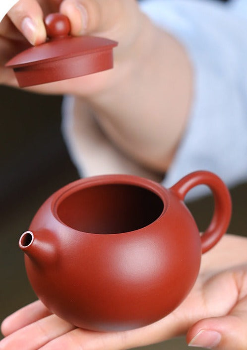 This is a pottery teapot.this is a Zhuni red clay teapot.