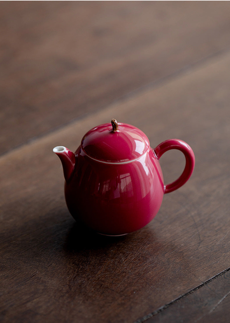 This is a ceramic teapot