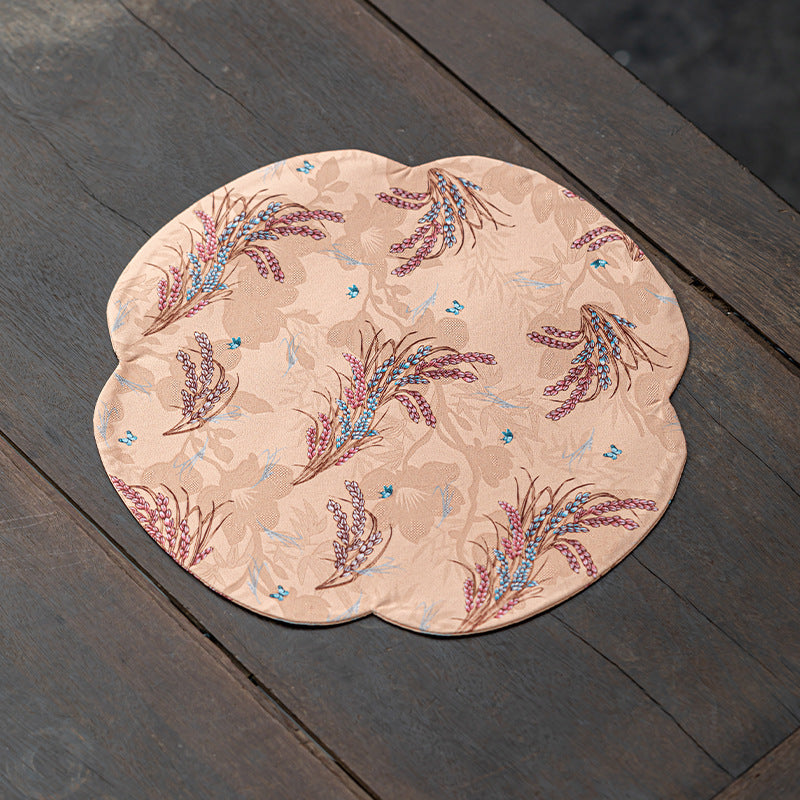 This is a silk brocade tea mat.this is a waterproof table cloth