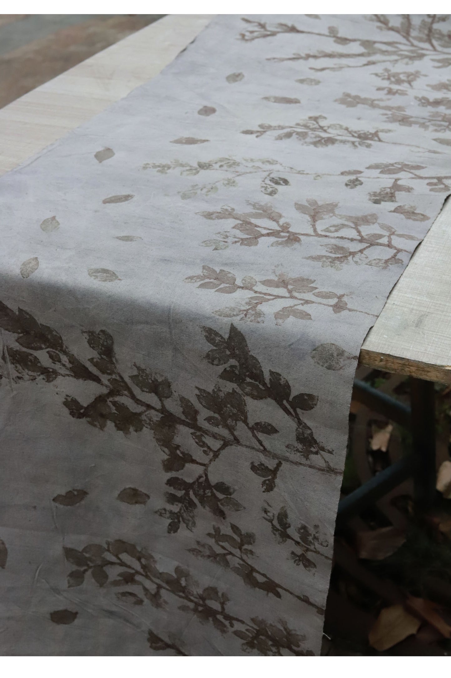 This is a plant-dyed tea mat table cloth