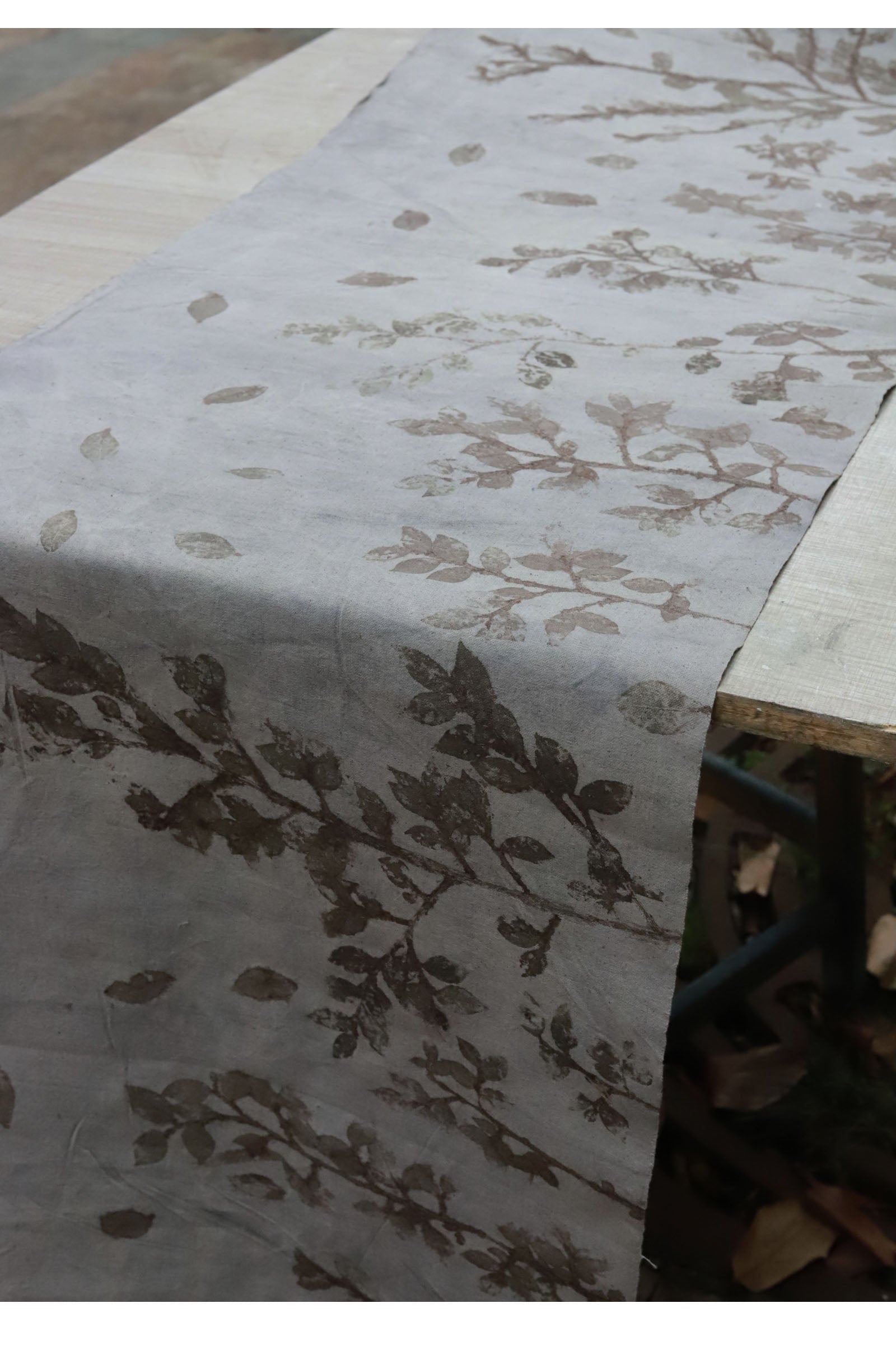 This is a plant-dyed tea mat table cloth