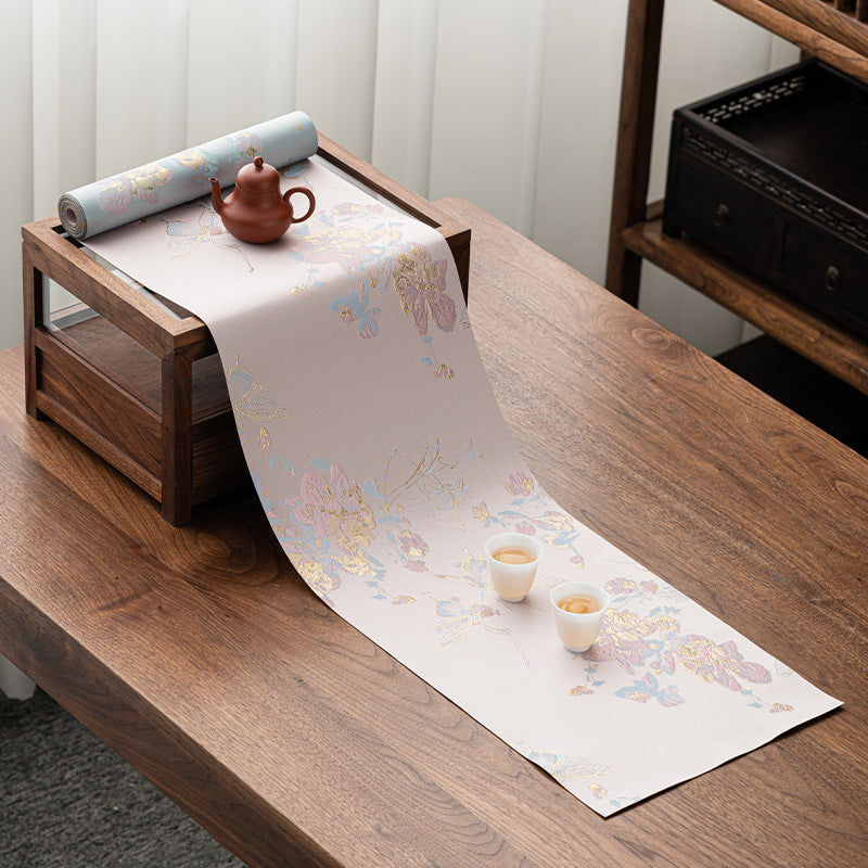 This is a silk brocade tea mat.this is a waterproof table cloth