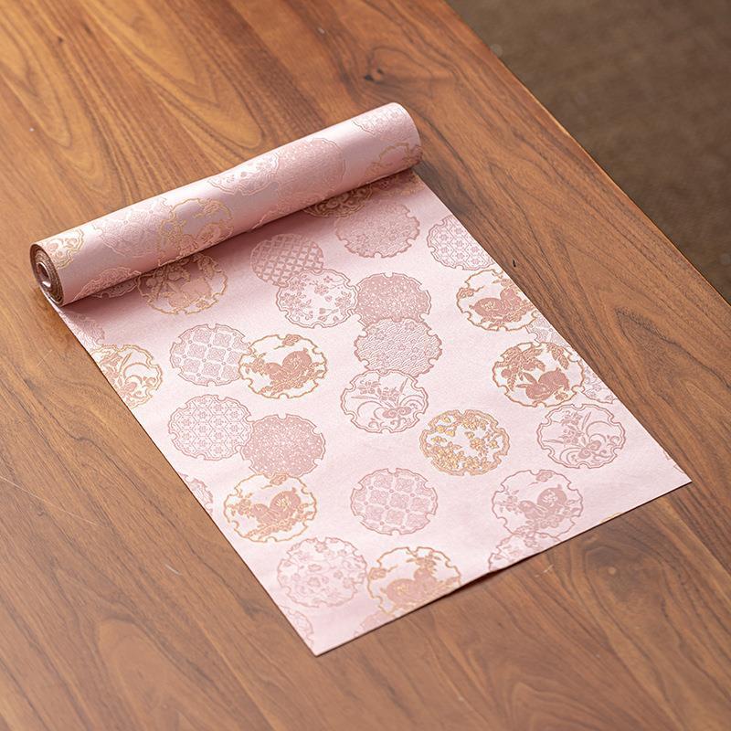 This is a silk brocade tea mat.this is a waterproof table cloth