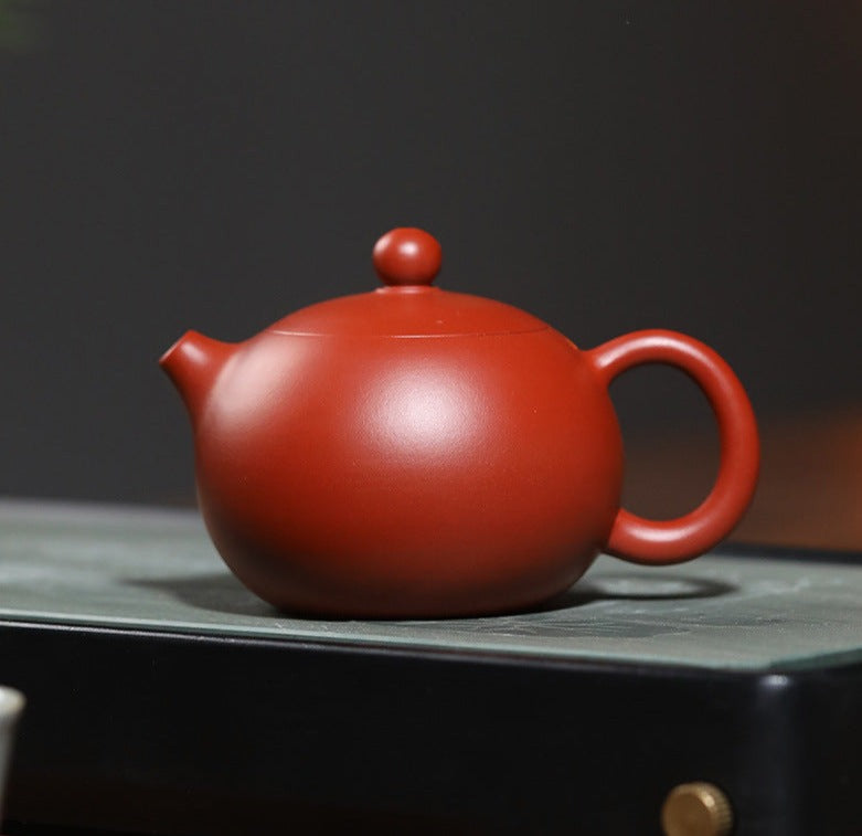 This is a pottery teapot.this is a Zhuni red clay teapot.