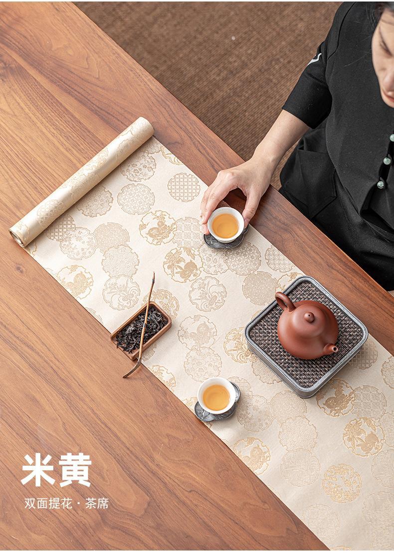 This is a silk brocade tea mat.this is a waterproof table cloth