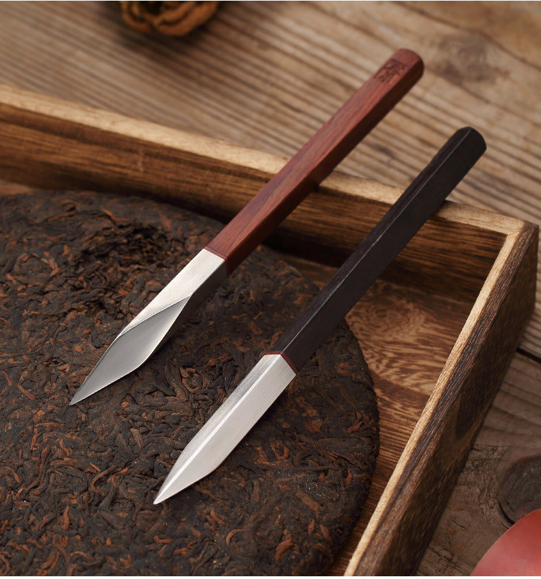 This is a sandalwood puerh cake knife tea knife tea needles