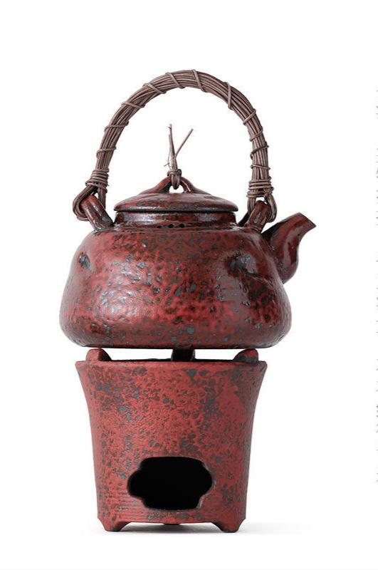 this is a pottery lifting kettle