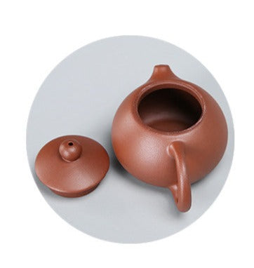 this is a mini zhuni red clay teapot