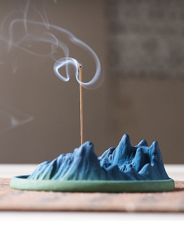 This is a pottery backflow incense holder